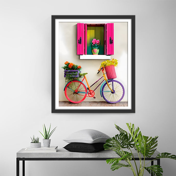 Regenboogkleurige Fiets Onder een Rozerood Raam Diamond Painting