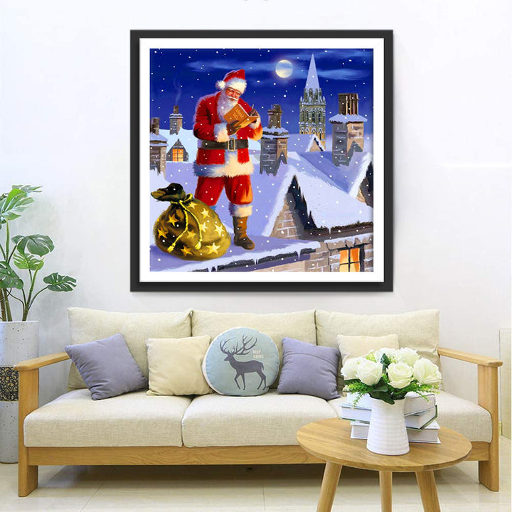 Kerstman op het Sneeuwwitte Dak in het Stadsgezicht Diamond Painting