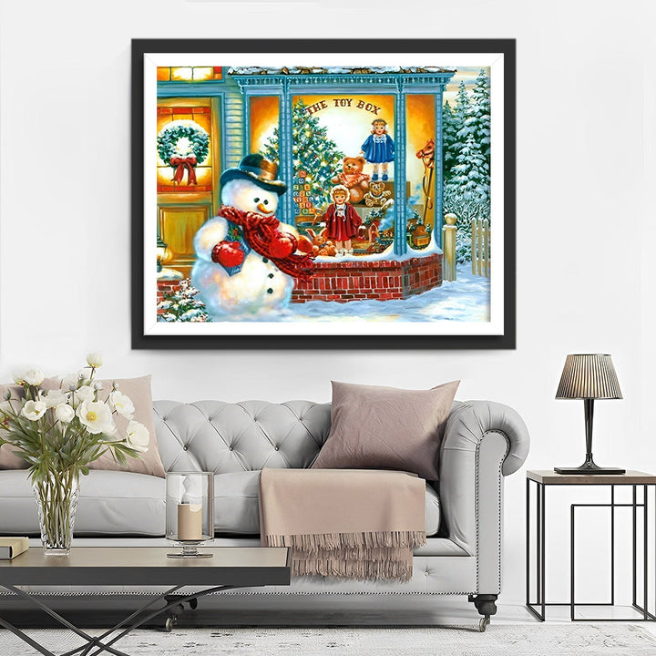 Sneeuwpop naast Feestelijke Speelgoedzaak Diamond Painting