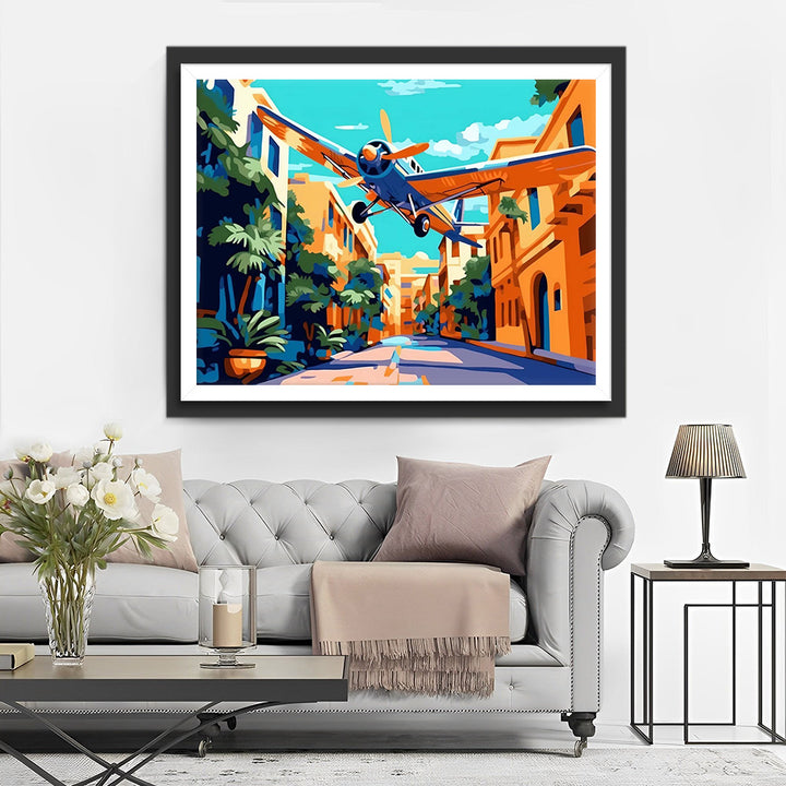 Vliegtuig in de Stad Diamond Painting