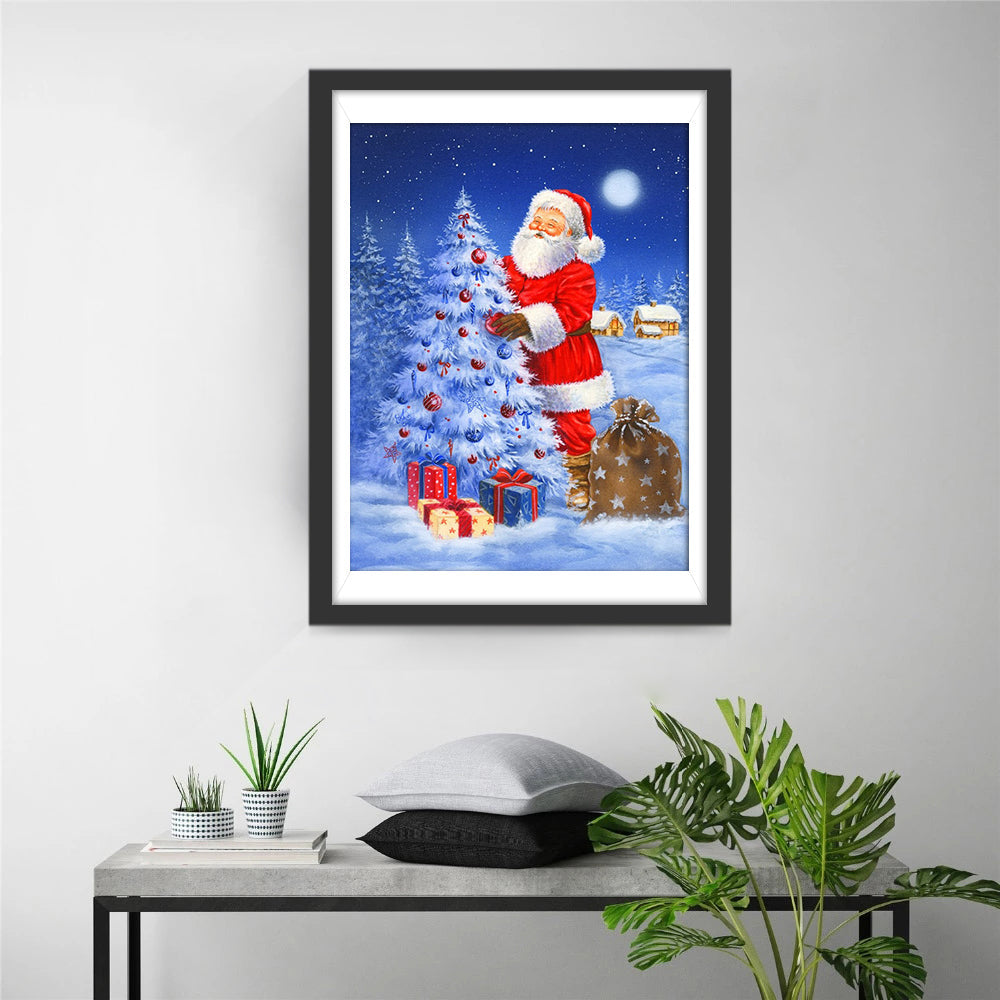 De Kerstman die een Dennenboom Vasthoudt in de Sneeuw Diamond Painting