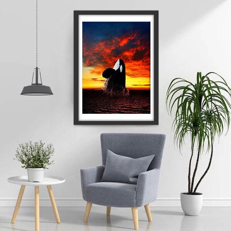 Dolfijn komt uit de Zee onder Rode Wolken Diamond Painting