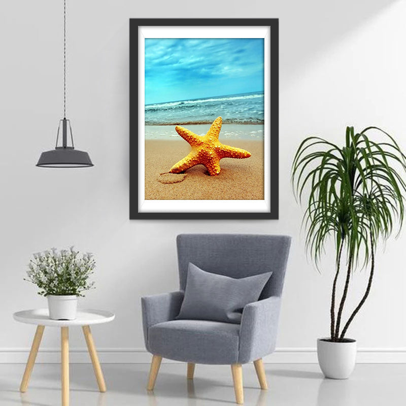 Een Gele Zeester op Zand Diamond Painting