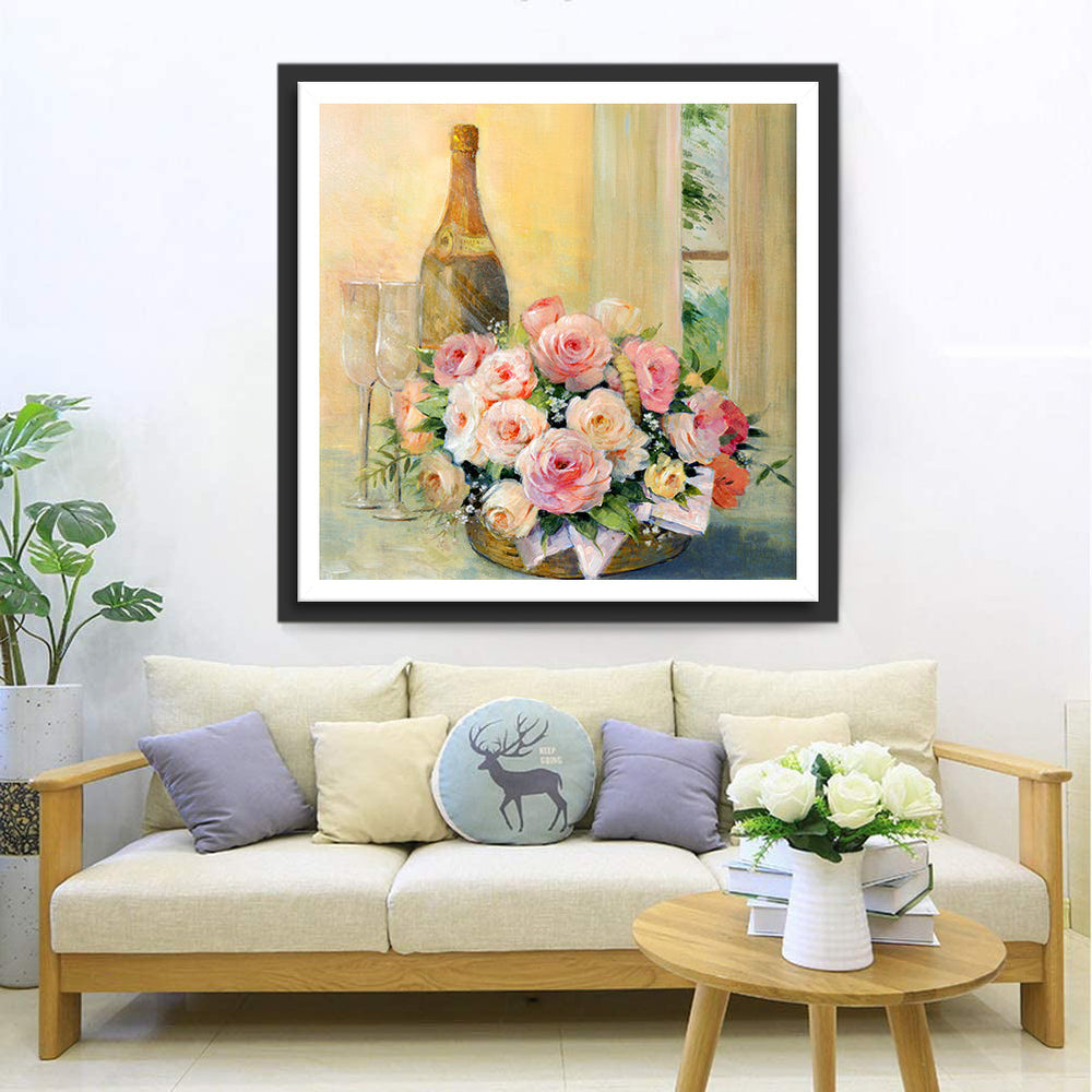 Een Mand Vol Zachte Roze Rozen naast Champagne en Glazen Diamond Painting