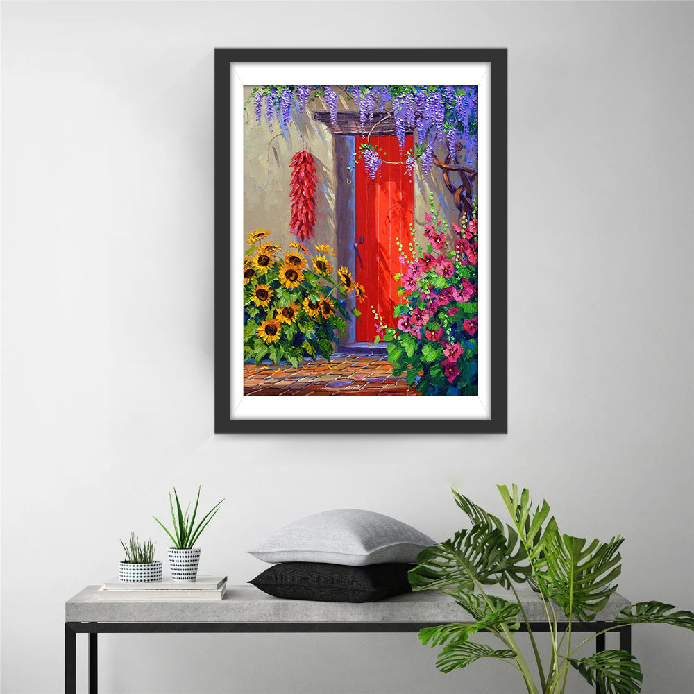Een Rode Deur omringd door Kleurrijke Bloemen Diamond Painting