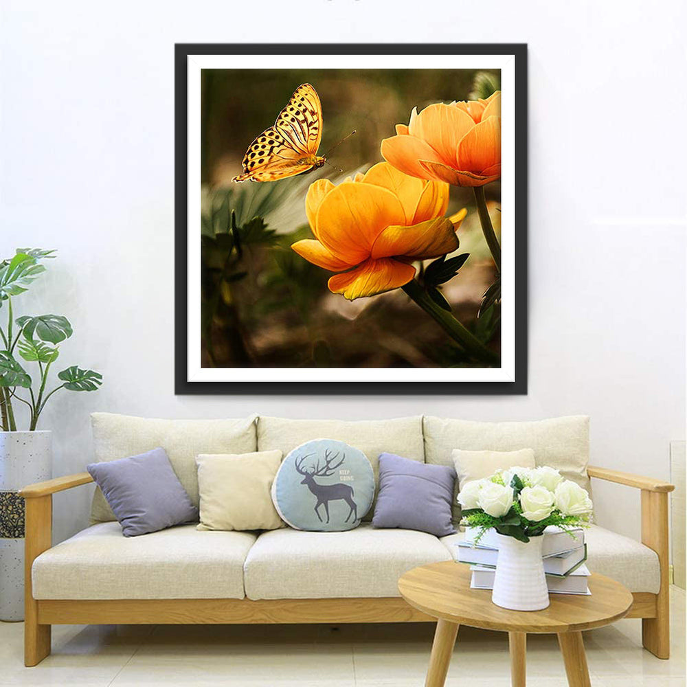 Een Vlinder bij Oranje Bloemen Diamond Painting