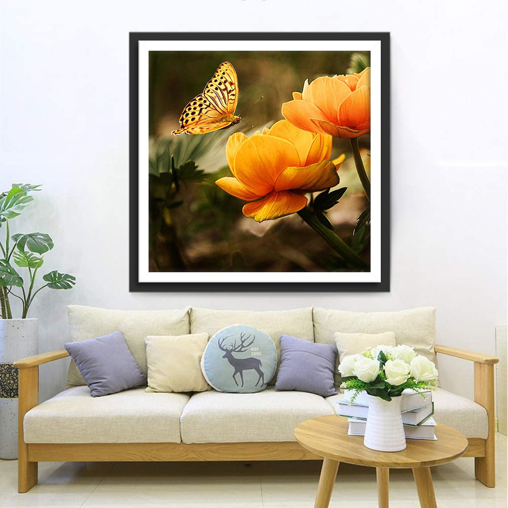 Een Vlinder bij Oranje Bloemen Diamond Painting