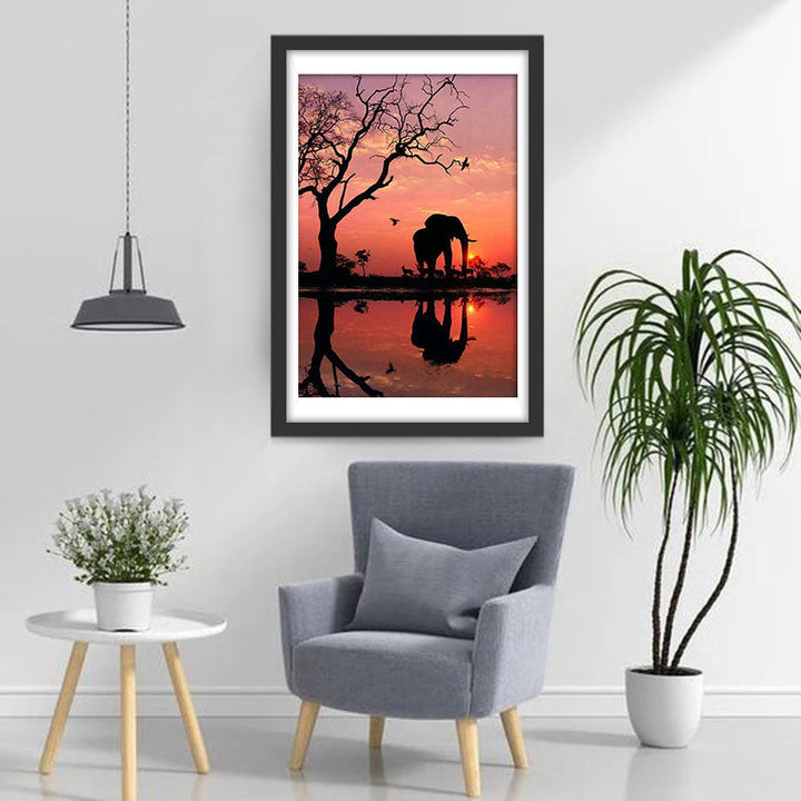 Ein Elefant unter Totem Baum in der Abendsonne Diamond Painting