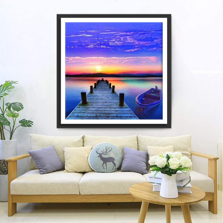 Houten Steiger en Bootje in de Kleurrijke Gloed Diamond Painting