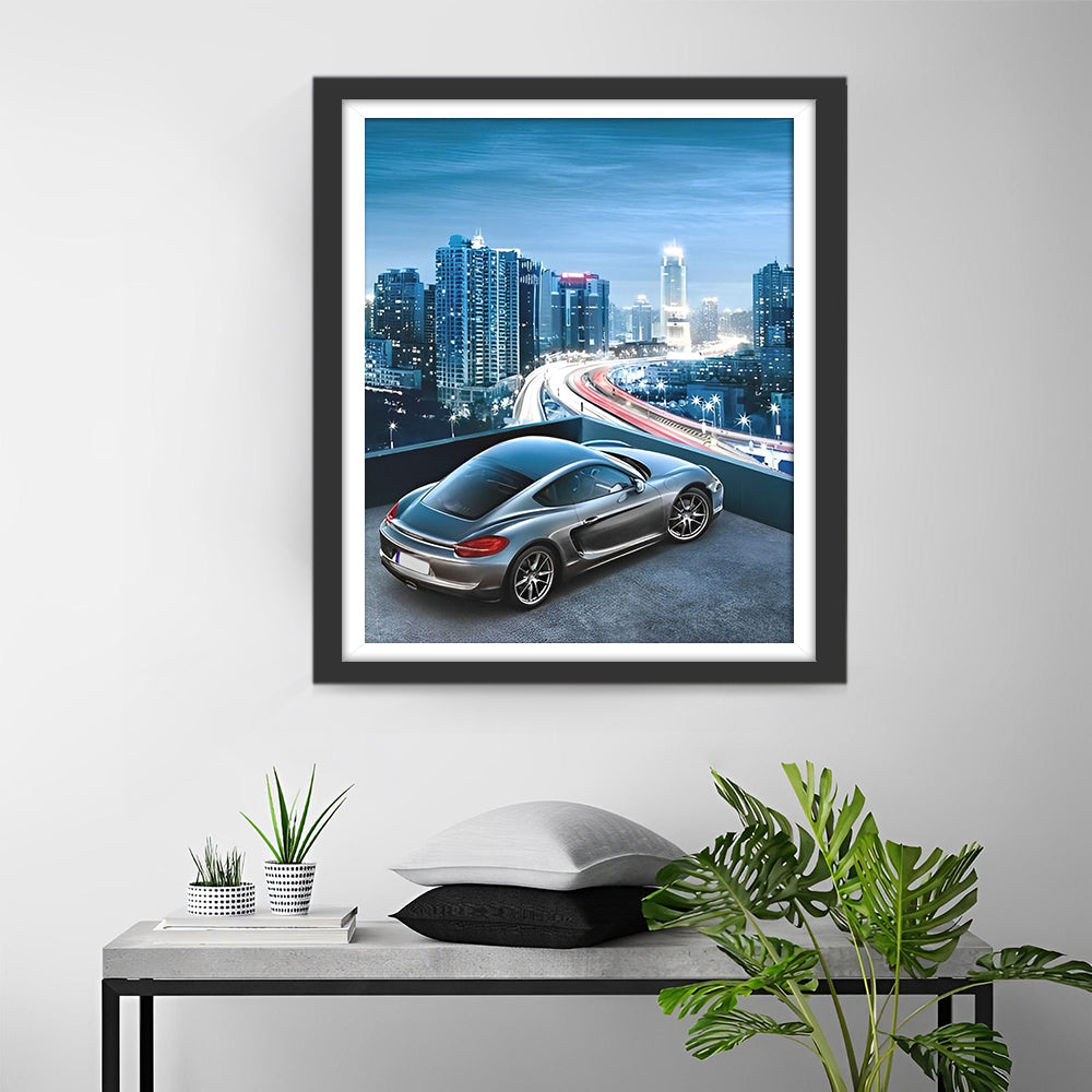 Opvallende Auto en Glimmende Stadshorizon Diamond Painting