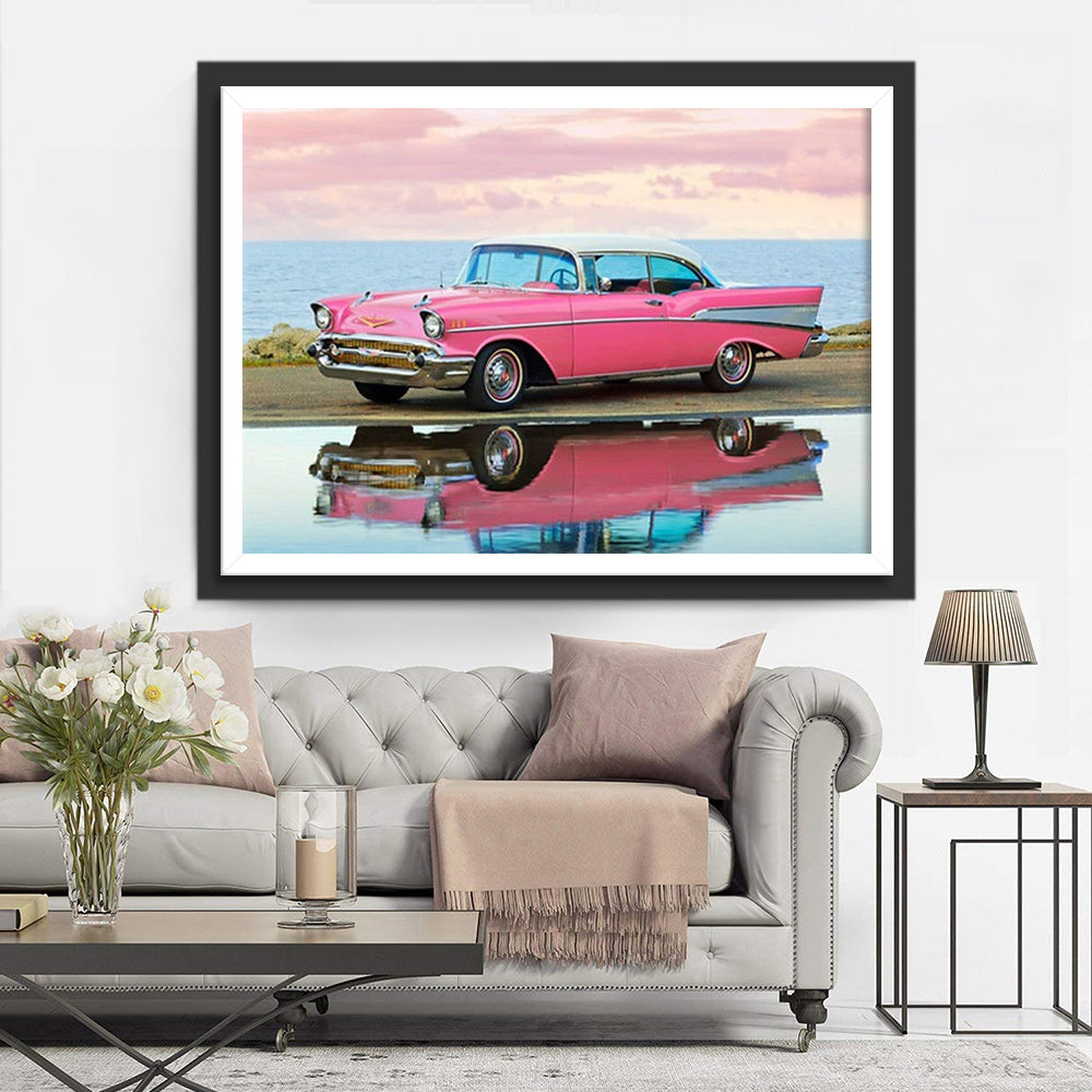 Roze Klassieke Chevrolet Bel Air aan Zee met Spiegeling in het Water Diamond Painting